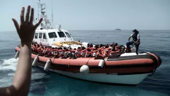 Aquarius is currently in the process of transferring 400 persons to two Italian Navy ships, at the request of the Italian MRCC. Aquarius was instructed by Maritime Rescue Coordination Centre in Rome to sail to Valencia to disembark the remaining 229 people.
 
While this appears to be a quick fix to the current political standoff, this should not set a precedent for future disembarkations. Rescued people should be disembarked in the nearest safe port available.