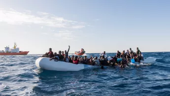 In a nightmarish day on the Mediterranean yesterday, 99 survivors from a sinking rubber boat were rescued by the Aquarius, a search and rescue vessel run by Médecins Sans Frontières (MSF) and SOS MEDITERRANEE, but an unknown number of men, women and children are missing, presumed drowned. Two women are confirmed dead.

“The scene was devastating, with many urgent medical cases in quick succession. They just kept coming, one after another, unconscious and not breathing,” said MSF nurse Aoife Ni Mhurchu. 
