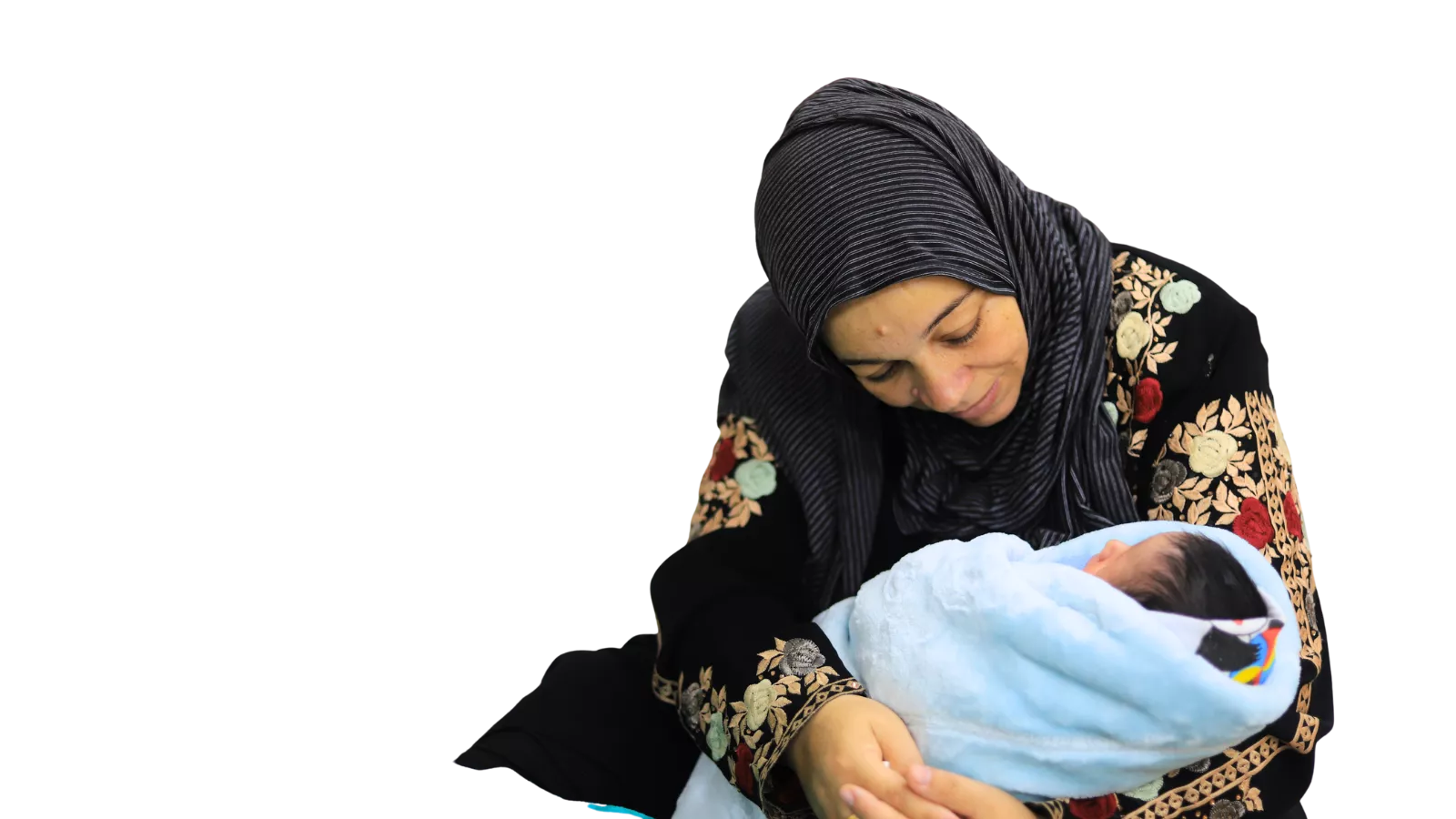 Frau mit Baby in Arm