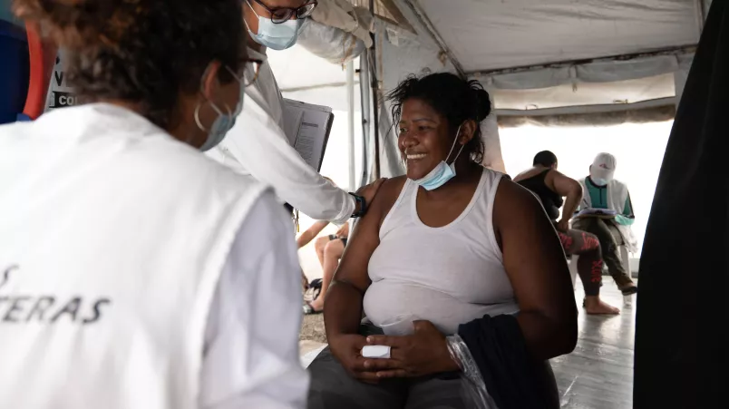 Eine Patientin teilt ein Lächeln mit unseren Psycholog*innen