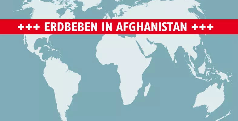 Grafik von Weltkarte mit Schriftbanner "Erdbeben in Afghanistan"