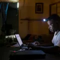 Jean Liyolongo, Head of Monga Intervention, works late into the night at the MSF base, Monga, in Bas-Uele Province, Democratic Republic of Congo.