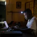 Jean Liyolongo, Head of Monga Intervention, works late into the night at the MSF base, Monga, in Bas-Uele Province, Democratic Republic of Congo.