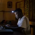 Jean Liyolongo, Head of Monga Intervention, works late into the night at the MSF base, Monga, in Bas-Uele Province, Democratic Republic of Congo.